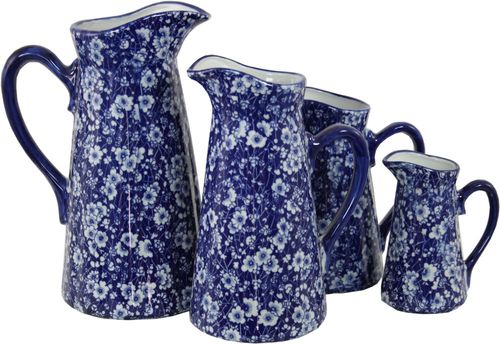 Charming Set of 4 Vintage Ceramic Jugs with Blue & White Daisies Design